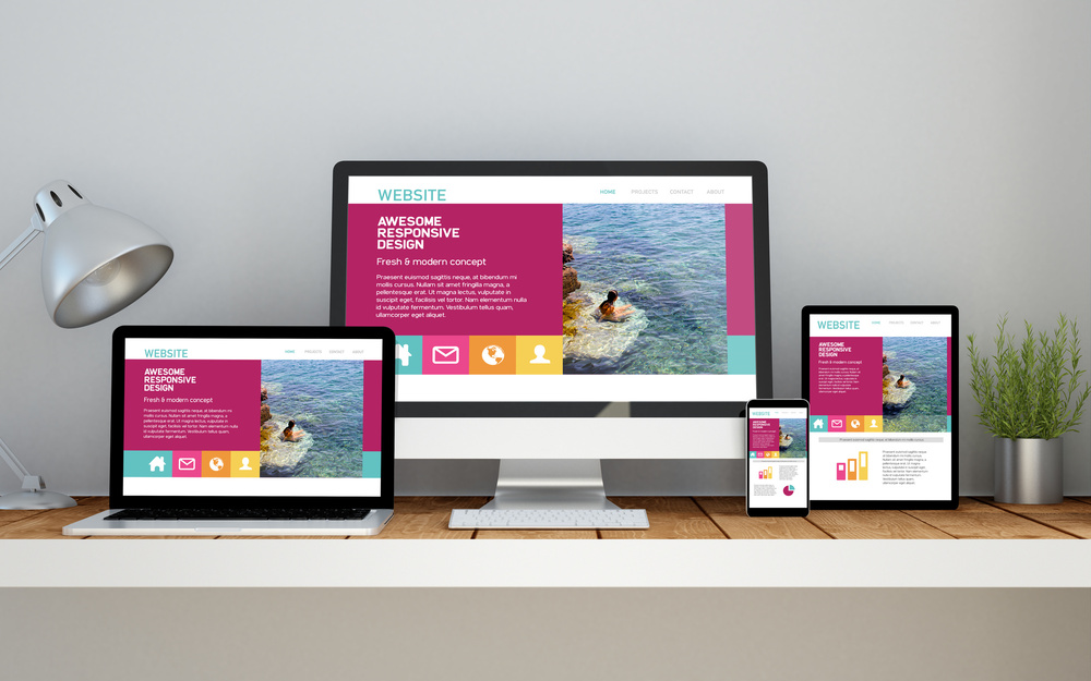 workplace with fresh responsive website on devices